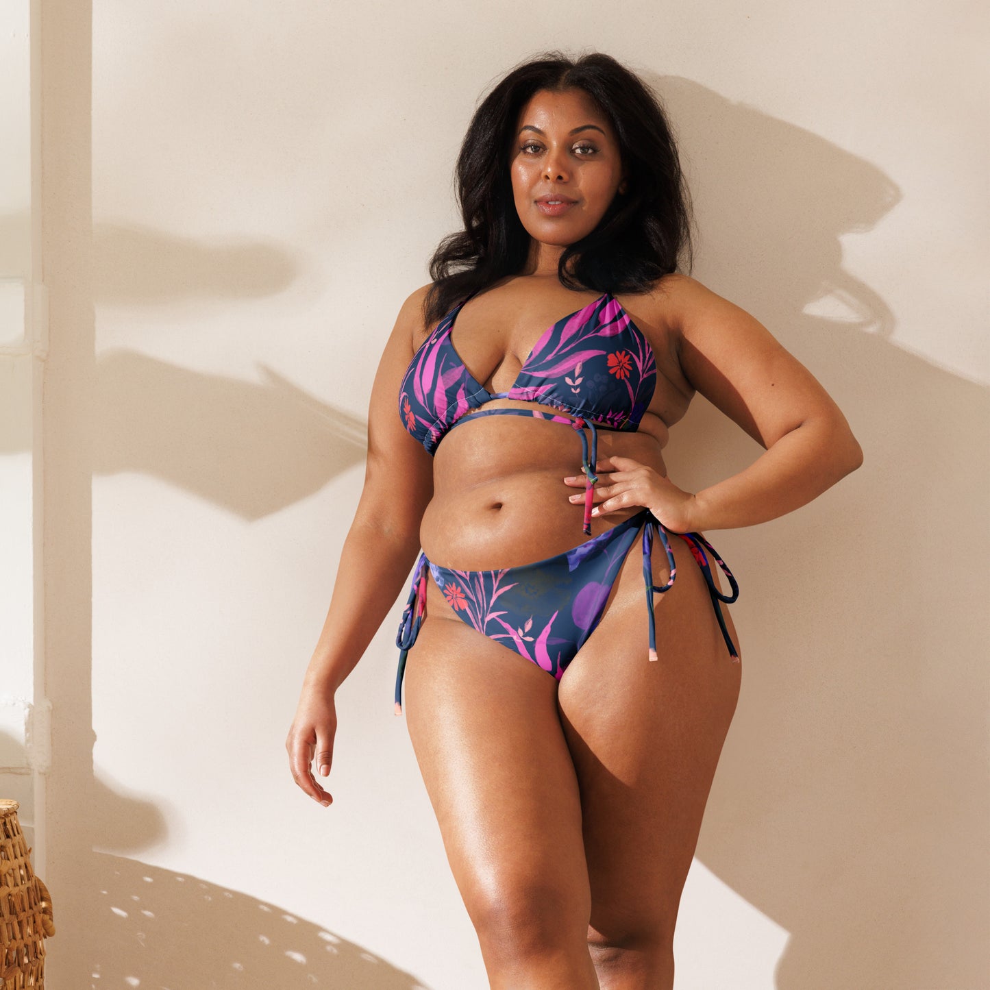 Multicolor Flowers Blue and multicolor recycled string bikini. Houston Collection. Design hand-painted by the Designer Maria Alejandra Echenique