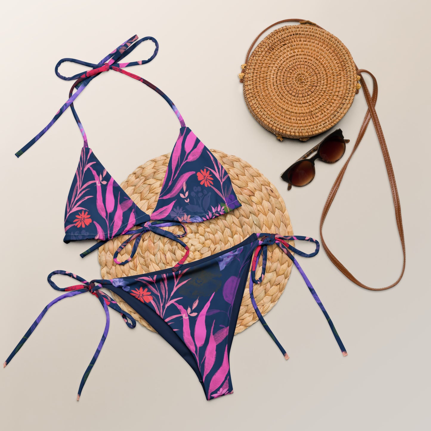 Multicolor Flowers Blue and multicolor recycled string bikini. Houston Collection. Design hand-painted by the Designer Maria Alejandra Echenique