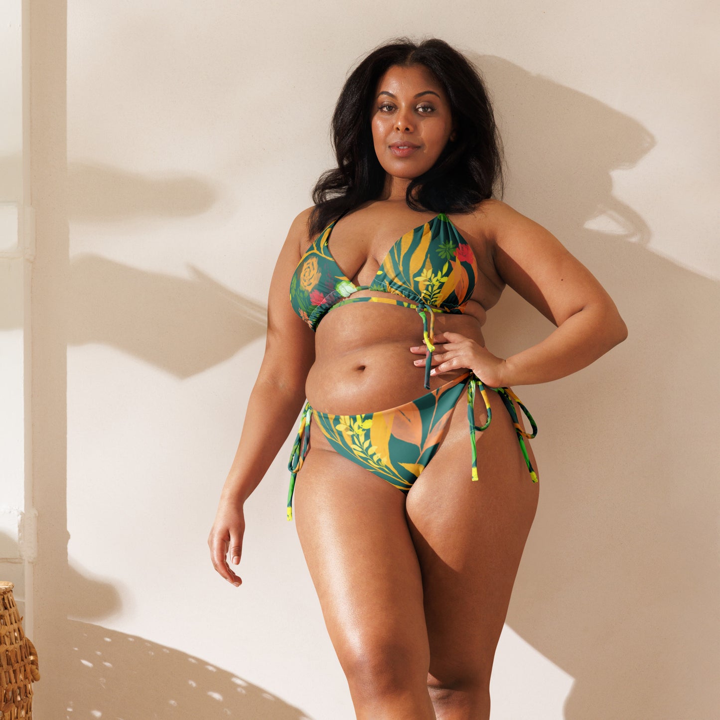 Multicolor Flowers green string bikini. Design hand-painted by the Designer Maria Alejandra Echenique