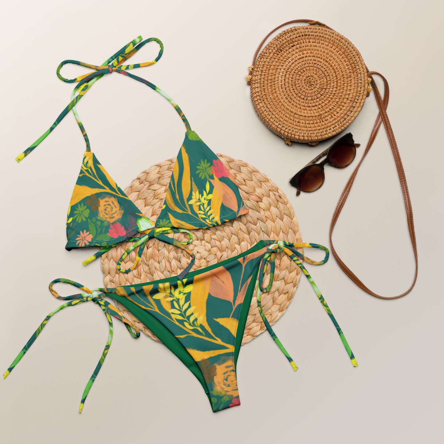 Multicolor Flowers green string bikini. Design hand-painted by the Designer Maria Alejandra Echenique
