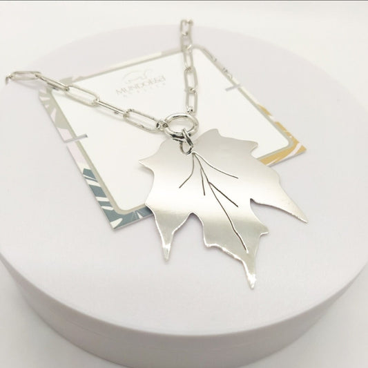 Silver Maple leaf charm long necklace.  Flourish Collection. Handmade by Ariadna Echenique. Silver plated